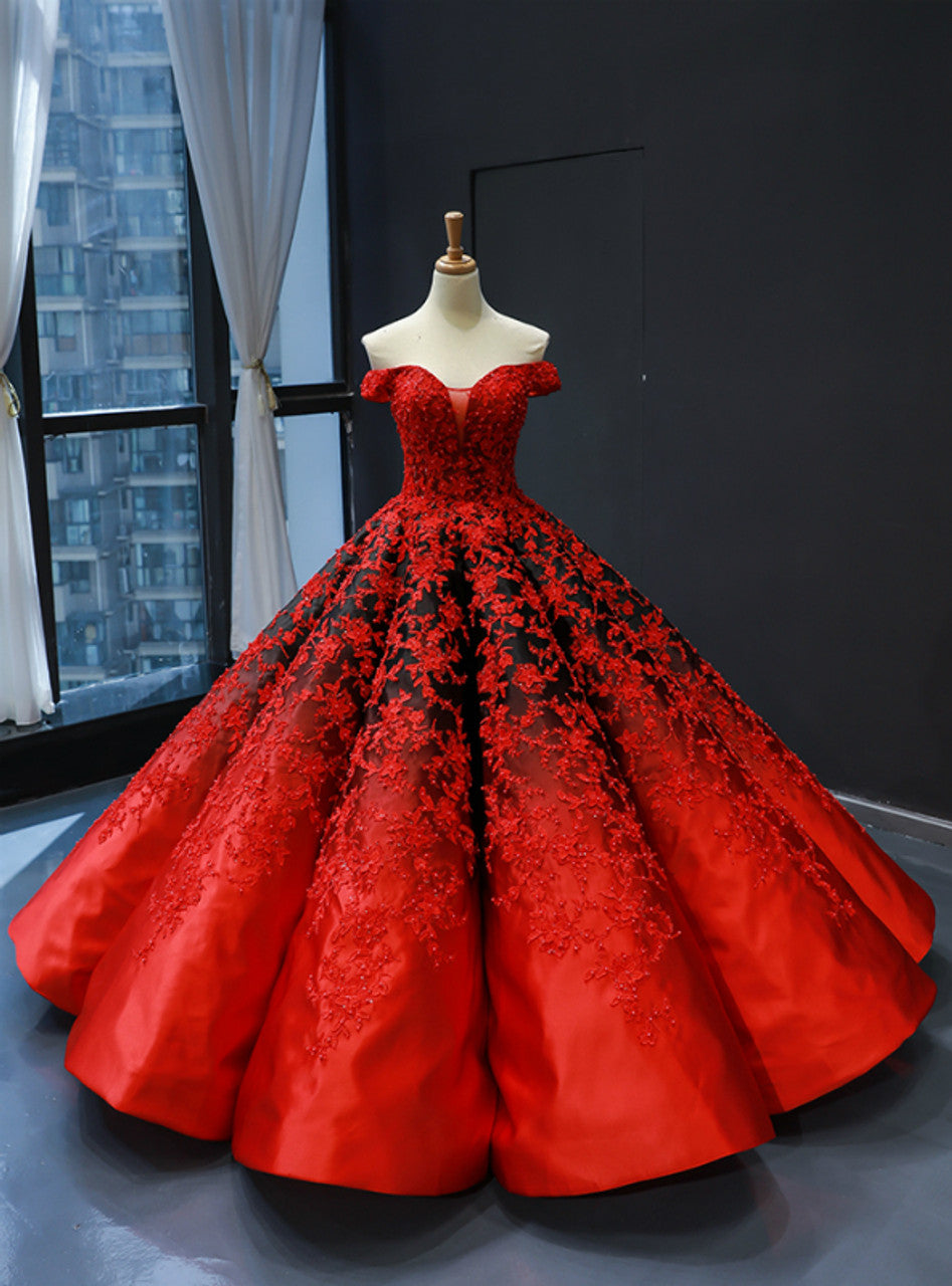 Red ball gown with black lace details.